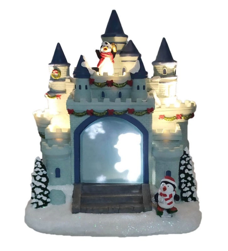 Château de pingouin de Noël à LED avec pingouin courant autour du château