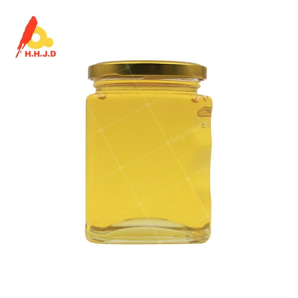 Bouteille en verre de 500 g de miel d'acacia mature pur non transformé