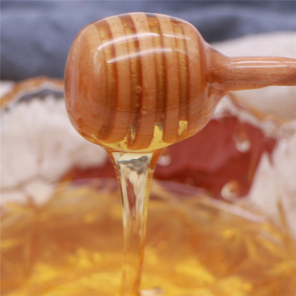Miel naturel au bocal en verre populaire du Moyen-Orient