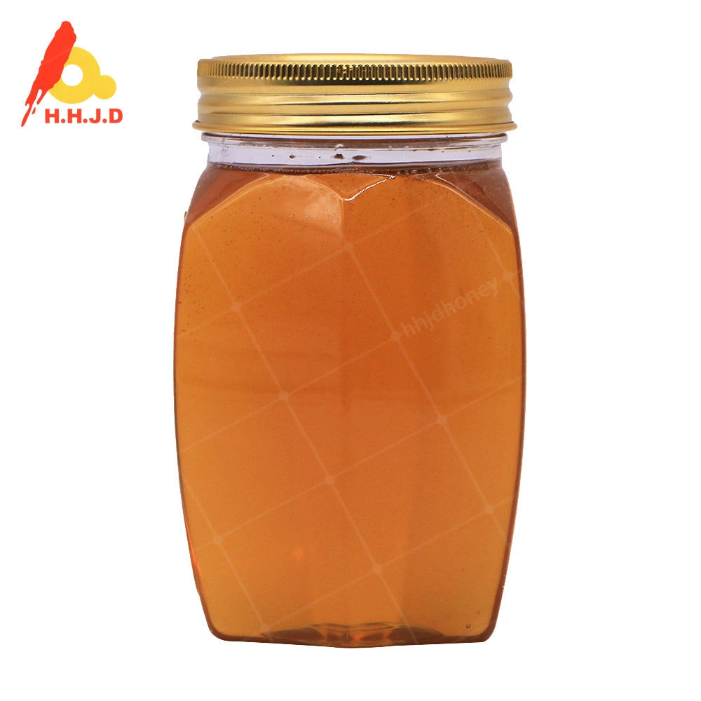 Bouteille en plastique hexagonale de 500 g de miel multifleur naturel pur