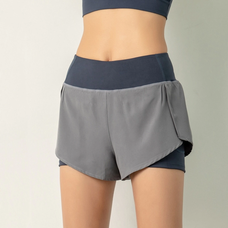 Short d'entraînement taille haute pour femme avec doublure