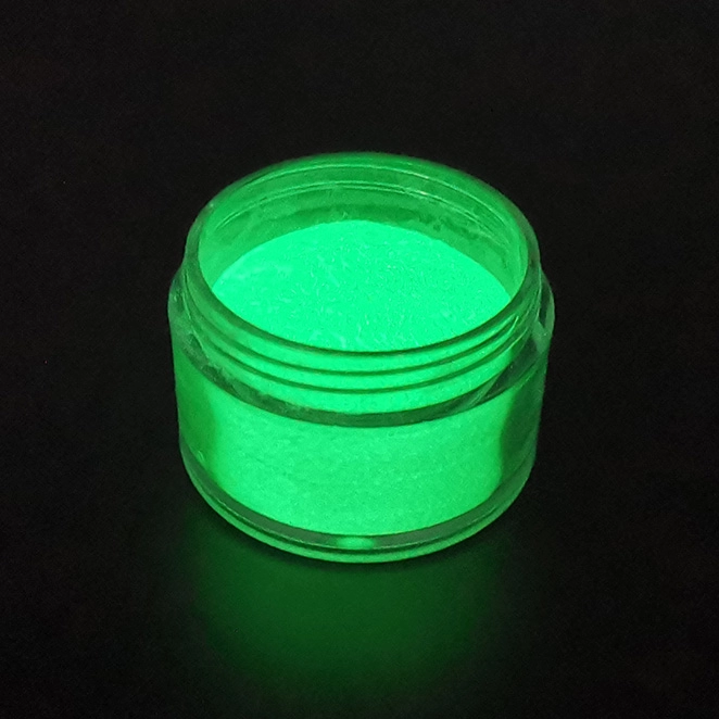 Poudre brillante verte fluorescente à absorption rapide dans le noir