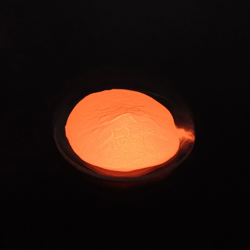 Pigment photoluminescent orange fluorescent à haute luminosité